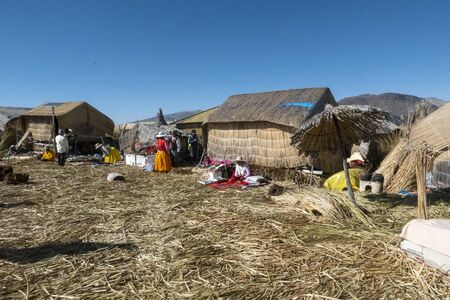 Lake Titicaca, Peru - August 2, 2019: Uros Tribe demonstrating life on the floating island at Lake Titicacaのeditorial素材