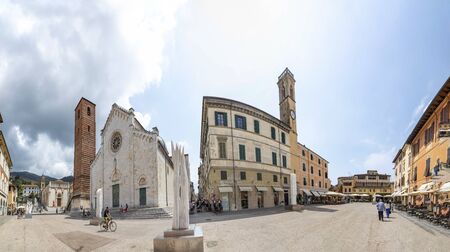 Pietrasanta, Italy - August 8, 2019: scenic central market place in Pietrasanta with cathedral.のeditorial素材