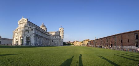 Pisa, Italy - August 9, 2019: people visit famous piazza del miracoli in Pisa, Tuscany, Italy.の写真素材