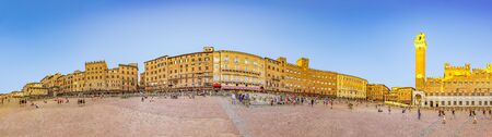 Siena, Italy - August 9, 2019: Palazzo Publico and Piazza del Campo in Siena. This historic center of Siena is a UNESCO World Heritage Site.のeditorial素材