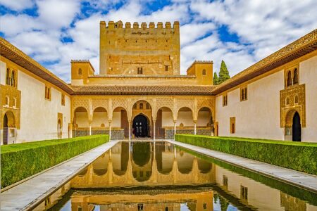 Columns and tower of the Alhambra in a sunny day. ItÂ´s a Nasrid monument in spainのeditorial素材
