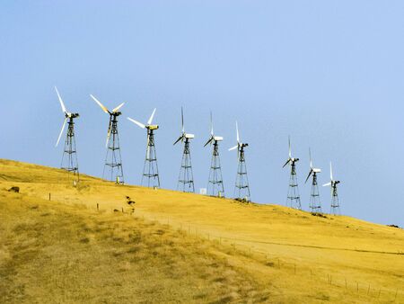 wind generators on the hills of San Francisco under blue sky