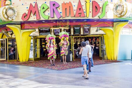Las Vegas, USA - July 18, 2008:  bar girls try to get tourists by animation into the casino in Fremont street experience.のeditorial素材