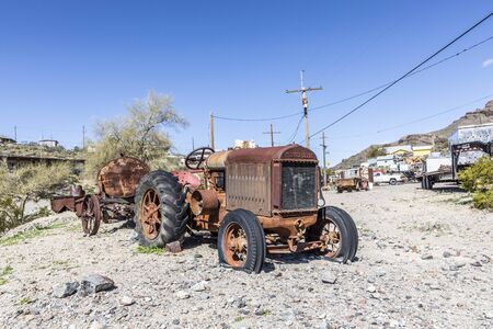 Oatman Ghost Town,   USA - March 7, 2019: old rotten tractor brand Mc Cormic-Deering along historical Route 66.のeditorial素材