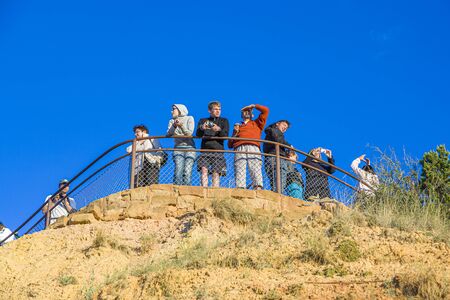 Bryce Canyon, USA - July 16, 2008: people watch the sunrise at Bryce canyon from outllook platform near grand staircase.のeditorial素材