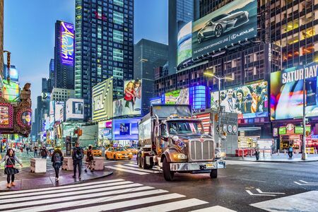 NEW YORK, USA  OCT 7, 2017:  neon advertising of News, brands and theaters at times square in late afternoon. Times square is a symbol for New York life and amusement.のeditorial素材