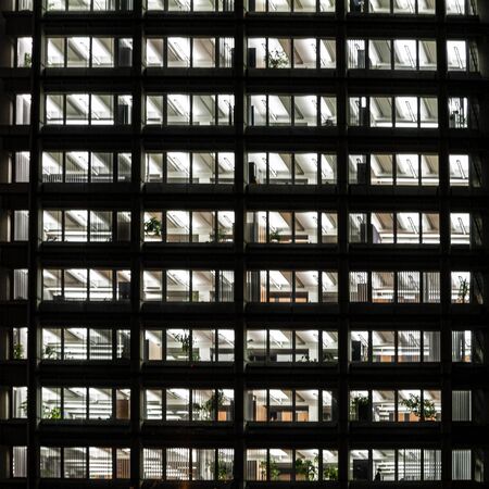 typical generic offices at night at an office skyscraper