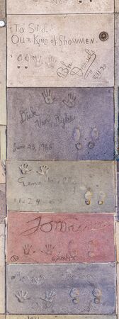 Los Angeles, USA - June 26, 2012: handprints of stars in Hollywood in the concrete of Chinese...