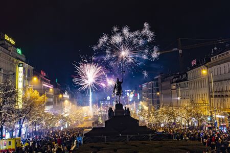 Prague, Czechia - January 1, 2010:  Large celebration of the New year 2019 on the main Prague square, the Wenceslas square. Hundreds of people were lunching fireworks and throwing firecrackersのeditorial素材