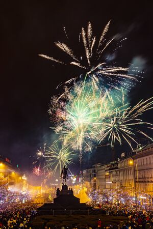Prague, Czechia - January 1, 2010:  Large celebration of the New year 2019 on the main Prague square, the Wenceslas square. Hundreds of people were lunching fireworks and throwing firecrackersのeditorial素材