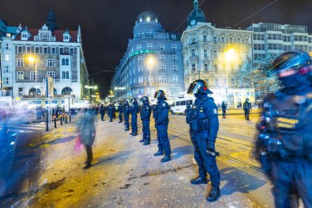 Prague, Czech Republic - January 1, 2020: the police pays attention for not entering the streetcar rails due of drunken people at the silvester party in Prague.のeditorial素材