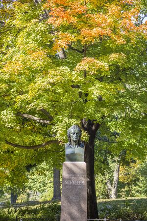 New York, USA - October 21, 2015: statue of Friedrich Schiller in  the Central Park. The park is the most visited urban park in the United States with 35 million visitors annually.のeditorial素材