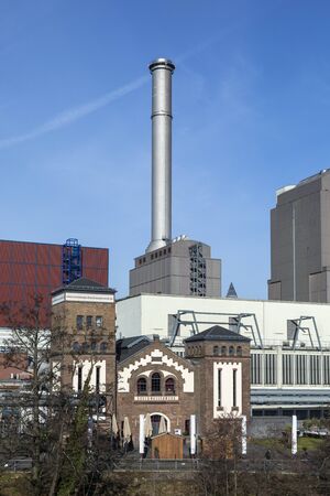 Frankfurt, Germany - Jan 11, 2020: view to coal fired power plant and historic pressurized water works at west harbor area in Frankfurt, Germany.のeditorial素材