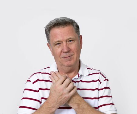 portrait of positive smiling mature man