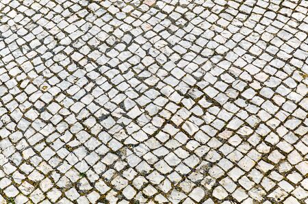 pattern of grey chistoric obblestone streetの写真素材