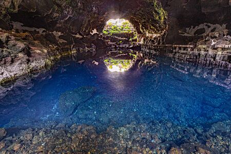 cave Jameos del Agua, scenic cave with lake in Lanzarote, Canary Islands, Spainの写真素材
