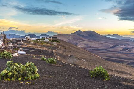 sunrise in Lanzarote seen from Volcano near Yaiza with dramatic sky, spainの写真素材