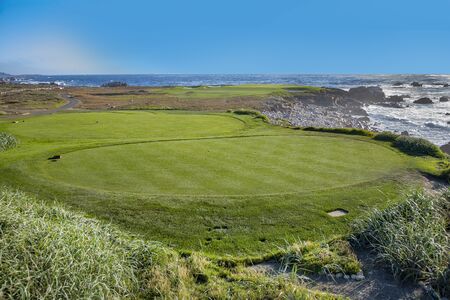 golf green of Pebble beach Golf club seen from Highway no 1 in Californiaの写真素材