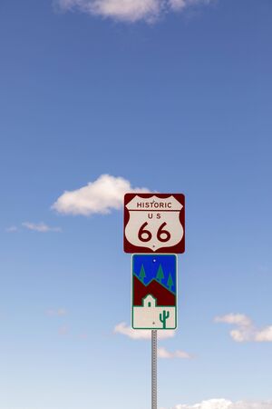 Route 66 sign under clear blue sky in Golden valleyの写真素材