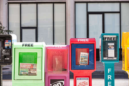 Phoenix, USA - June 14, 2012: newspaper boxes with free newspaper for everyone. These papers  are financed by advertising.のeditorial素材