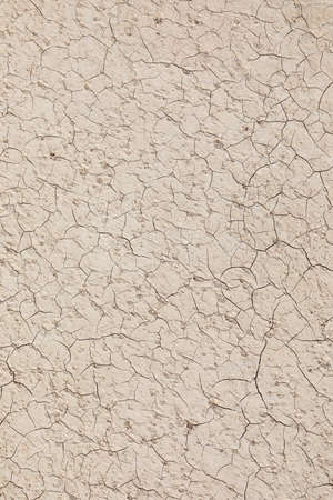 dried soil in the death valley gives an impression of heat