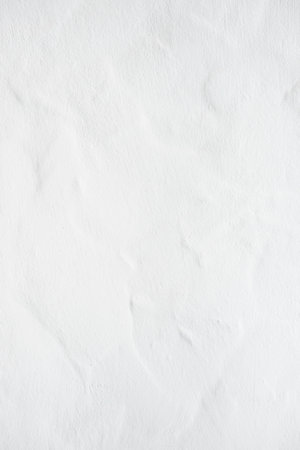 detail of white plaster wall as harmonic backgroundの写真素材