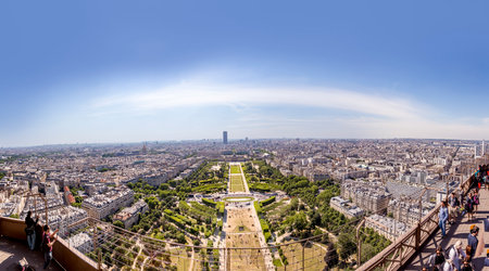 Paris, France - June 10, 2015: people watch the skyline of Paris from the upper platform at the...
