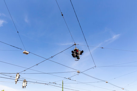 red traffic light at a crossing indicates that cars have to stopの写真素材