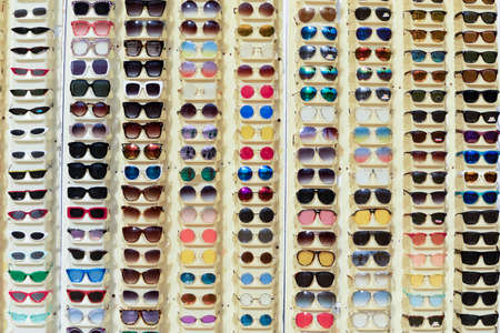 sunglasses without brand name and logo at a shopping booth at Venice beach