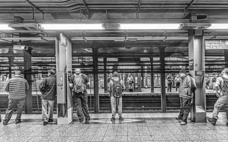 NEW YORK, USA - OCT 20, 2015: People wait at subway station Wall street in New York. With 1.75...
