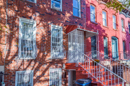 small brick houses in Union street in Brooklyn, New York with typical facade