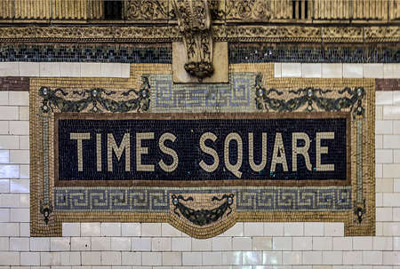 New York, USA - OCT 22, 2015: old vintage sign Times Square Subway Station in Manhattan. Intricate tiles with symbols in terra cotta describe the place.のeditorial素材