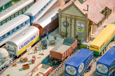 Frankfurt, Germany - March 11, 2021: plastic people waiting at the train station for loading cargo...
