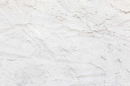 detail of plasteted wall at a house with structure and white paintの写真素材