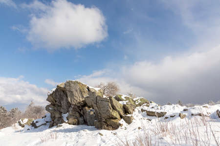 scenic snow landscape in Germany, Hesse at mountain Feldberg with Brunhildis rockの写真素材
