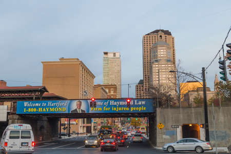 Hartford, USA - October 27, 2015: skyline of Hartford in evening sun with historic and modern skyscraper.のeditorial素材