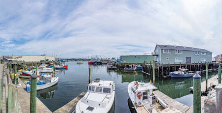 Gloucester, USA - September 14, 2017: fishermens boats and yachts ancor at the pier in Gloucester, USA.のeditorial素材