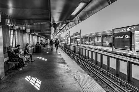 Boston, USA - September 13, 2017: people wait for the underground in Boston, USA. The metro Massachusetts Bay Transportation Authority (MBTA) operates heavy-rail, light-rail and bus transit services in the Boston metropolitan area.のeditorial素材