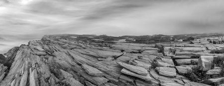 scenic coastline at Cape Elisabeth in fog with spectacular stone formations