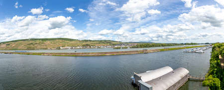 scenic view to Ruedesheim with Niederwald monument in the vineyards