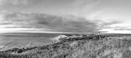 Gay Head Lighthouse and Gay Head cliffs of clay at the westernmost point of Martha's Vineyard in Aquinnah, Massachusetts, USA. This historic lighthouse was built in 1856.の写真素材