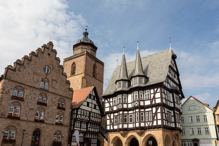 Alsfeld, Germany - June 25, 2021: famous town hall and half timbered historic houses at central square in Alsfeld, Germany.のeditorial素材