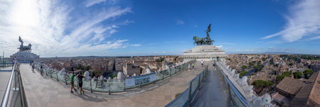 Rome, Italy - August 5, 2021: people enjoy the view from Victor Emmanuel II National Monument to the skyline of Rome.のeditorial素材
