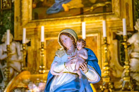 Rome, Italy - August 1, 2021: Altar scene in the church Chiesa di Santa Maria in Portico in...