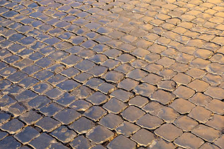 granite background of old cobble stone streetの写真素材