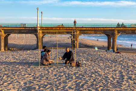 Los Angeles, USA - March 4, 2019: tea ceremony by a japanese monk at the beach in Redondo Bay in Los Angeles, USA.のeditorial素材