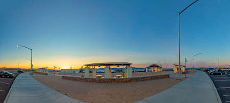 Las Vegas, USA - March 11, 2019: empty parking area with petrol station in panoramic view in sunset...