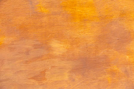 bright orange - yellow plaster wall background in typical mediterranean colors