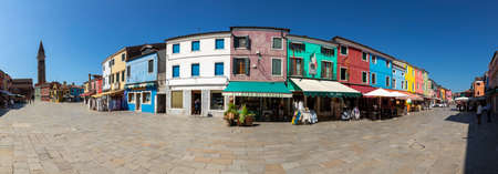 Venice, Italy - July 1, 2021: View of the colorful houses in Burano, Venice, Italy. Burano is an...