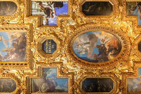 Venice, Italy - July 7, 2021: The chamber of the great council at the Doge Palace with tourist. Ceiling detail.のeditorial素材